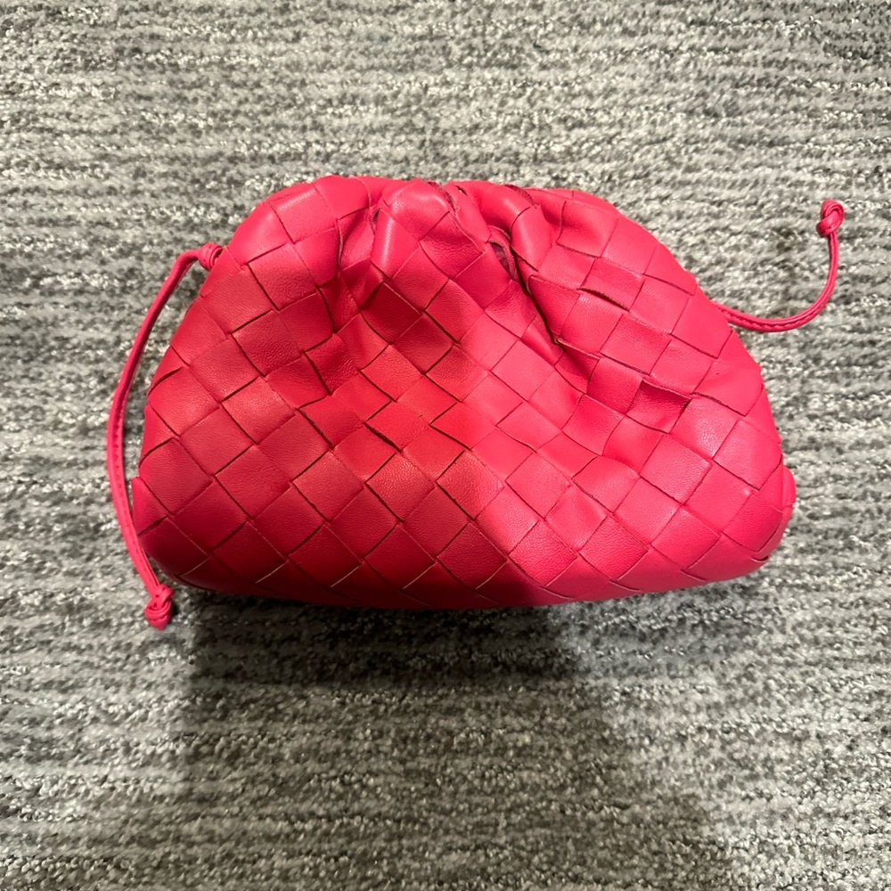 BOTTEGA VENETA
Pink Mini Intrecciato Clutch